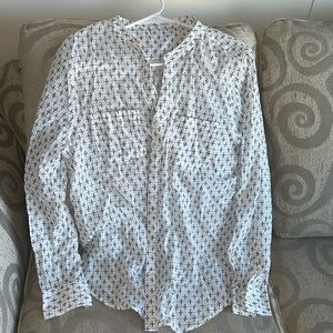 Carve designs unique blouse. Beautiful pattern.